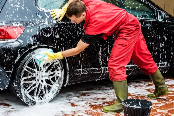 a man washing car 
