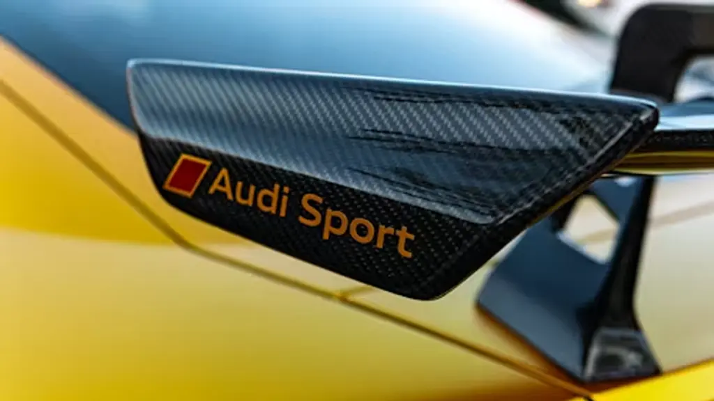 _Carbon fiber audi sport spoiler on a yellow car