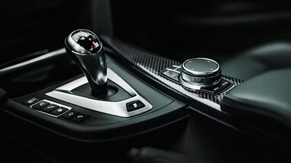 _black and silver gear shift lever carbon fiber parts