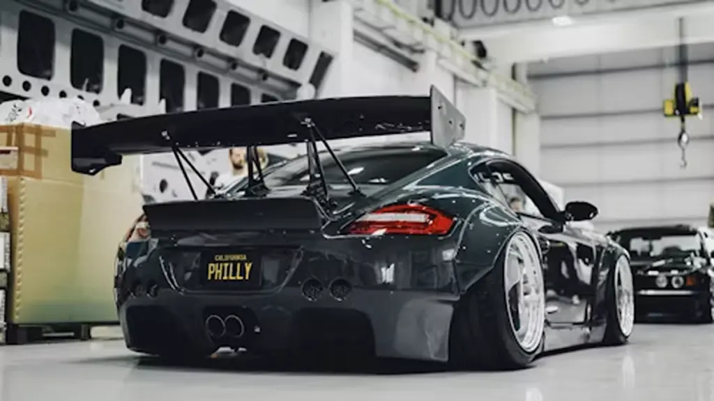 a black sports car with wing