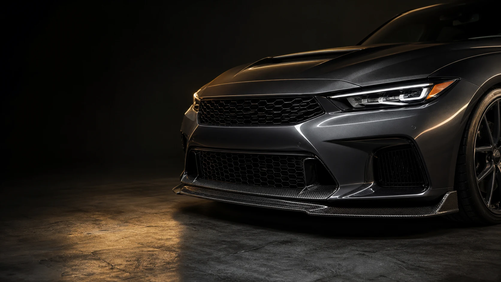Carbon fiber front lip and splitter installed on vehicle