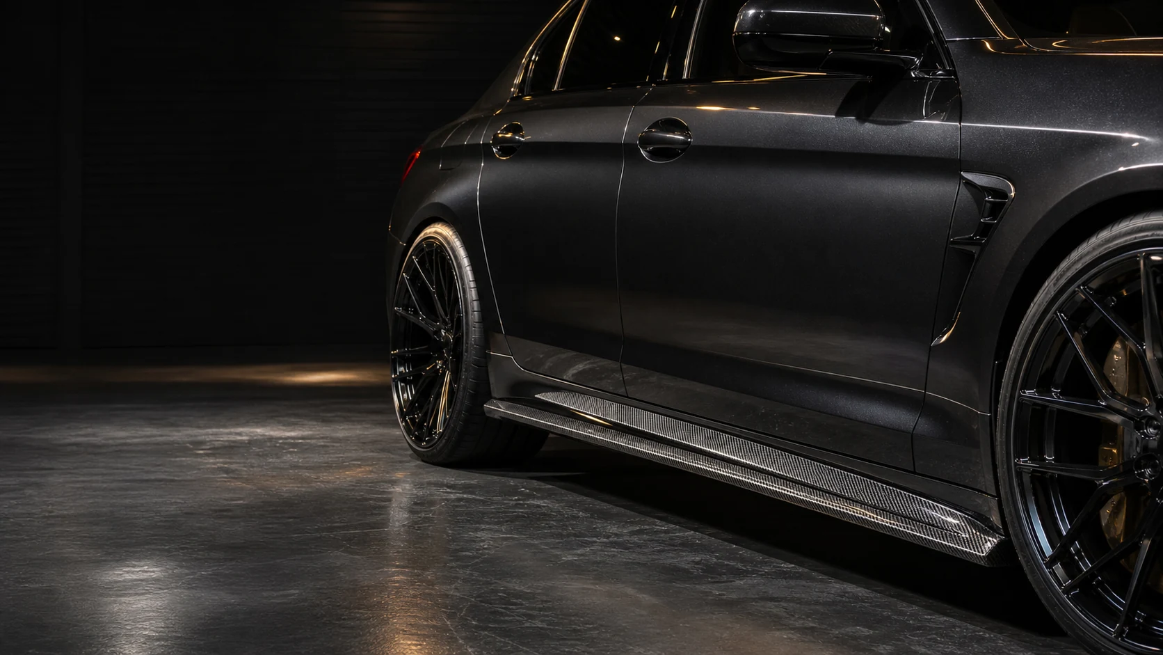 Carbon fiber side skirt extension installed along vehicle rocker panel