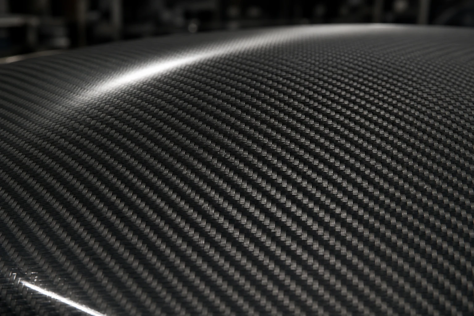 Toray 3K carbon fiber weave close-up on engine hood